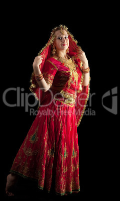 young girl dance in red indian oriental costume