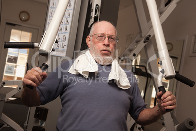 Elderly Adult Man Working Out in the Gym.