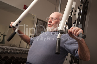 Senior Adult Man Working Out in the Gym.