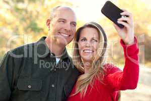 Attractive Couple Pose for a Self Portrait Outdoors