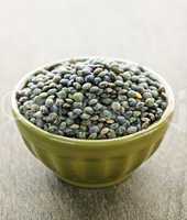 Bowl of uncooked French lentils