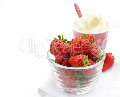 Bowl of strawberries with whipped cream