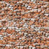 Red brickwork seamless background.