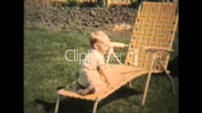 Boy Plays With Garden Hose (1963 Vintage 8mm film)