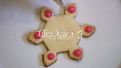 Decorating Christmas Snowflake Cookie