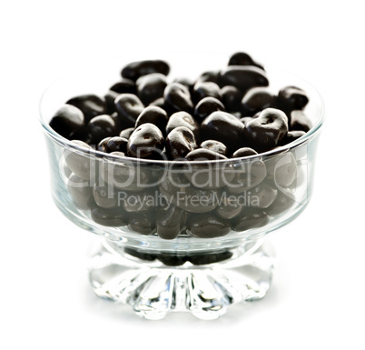 Bowl of chocolate coated cranberries or raisins