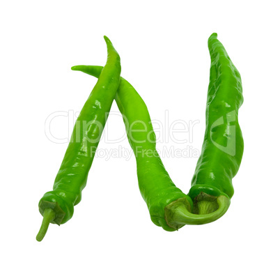 Letter N composed of green peppers