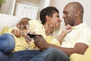 Happy African American Man & Woman Couple Drinking Wine