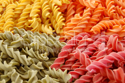 four flavors of fusilli pasta