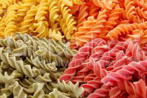 four flavors of fusilli pasta