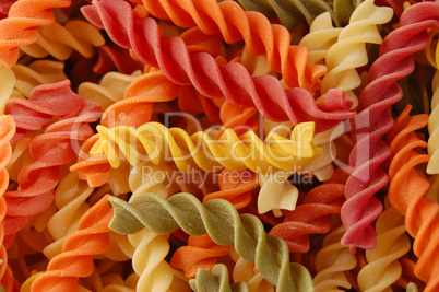 multi colored twirls pasta background