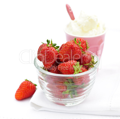 Bowl of strawberries with whipped cream