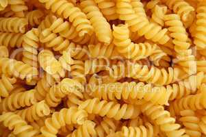 Eliche twirls pasta background