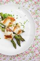 Fresh meal with asparagus and grilled haloumi cheese