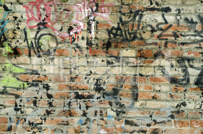 Graffiti an einer Mauer in Venedig