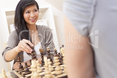 Beautiful Chinese Oriental Asian Woman Playing Chess