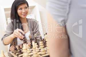 Beautiful Chinese Oriental Asian Woman Playing Chess