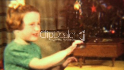 Girl Plays Toy Piano By Christmas Tree (1942 Vintage 8mm)