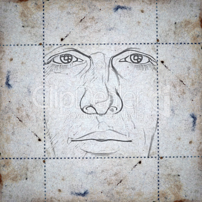 face on stained paper