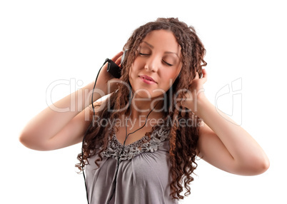 Girl holding headphones.
