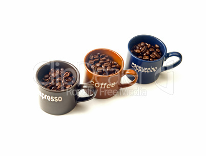 coffee cups with coffee beans