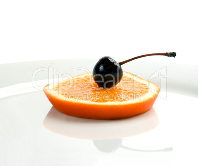 orange&cherry on a plate