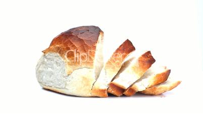 Ein angeschnittenes ganzes Brot von allen Seiten