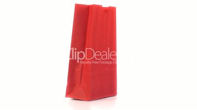 Rote Einkaufstüte mit weißen Hintergrund