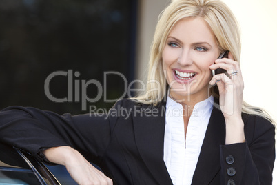 Blond Businesswoman Talking On Her Cell Phone