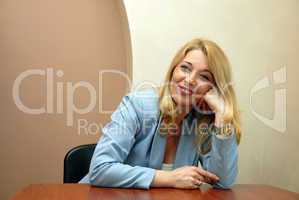 Businesswoman in office relaxed