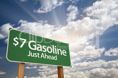 $7 Gasoline Green Road Sign and Clouds