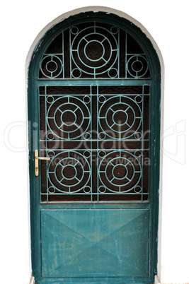 metal door with concentric circles motif
