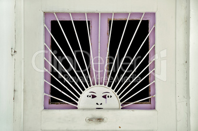 metal sun pattern on vintage door