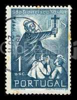 priest with cross postage stamp