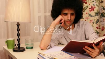 young man studying on the book 2