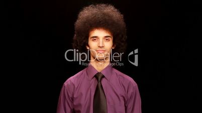 young man cleaning his shirt