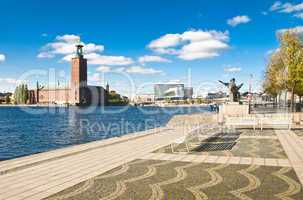 Stockholm city hall and quay  in summer