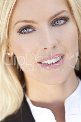 Portrait of Beautiful Young Blond Woman With Blue Eyes