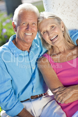 Happy Senior Couple Smiling Outside in Sunshine