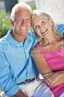 Happy Senior Couple Smiling Outside in Sunshine