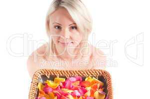 Woman and petals on the plate