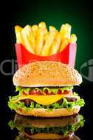 Tasty hamburger and french fries