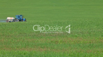 tractor spraying  field