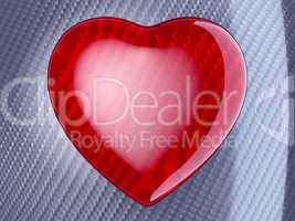 Red heart shape over carbon fibre