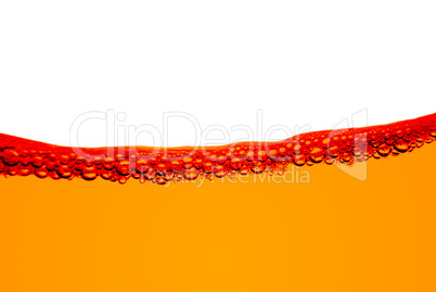 Orange fuel line with bubbles