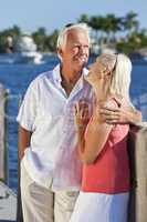 Happy Senior Couple On Vacation By Tropical Sea