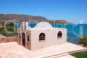 New building probably Orthodox Church and Spinalonga island at b
