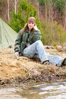 Camping woman tent nature sitting stream