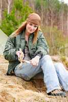Camping woman tent nature cut stick