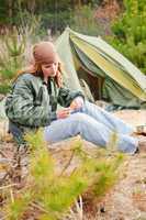 Camping woman tent nature cut sausage